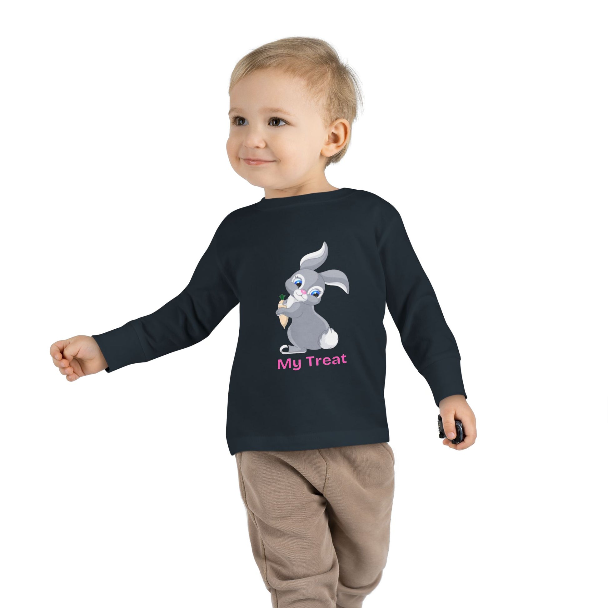 Child wearing a black long-sleeve shirt with a cartoon character and text on a white background

