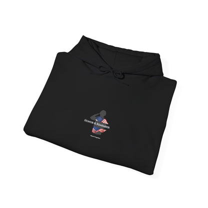 Folded black hoodie with 'EL GV' text on a white background