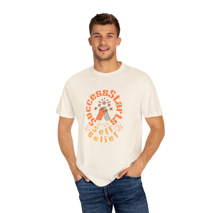 Man wearing a white t-shirt with orange text and graphics on a white background