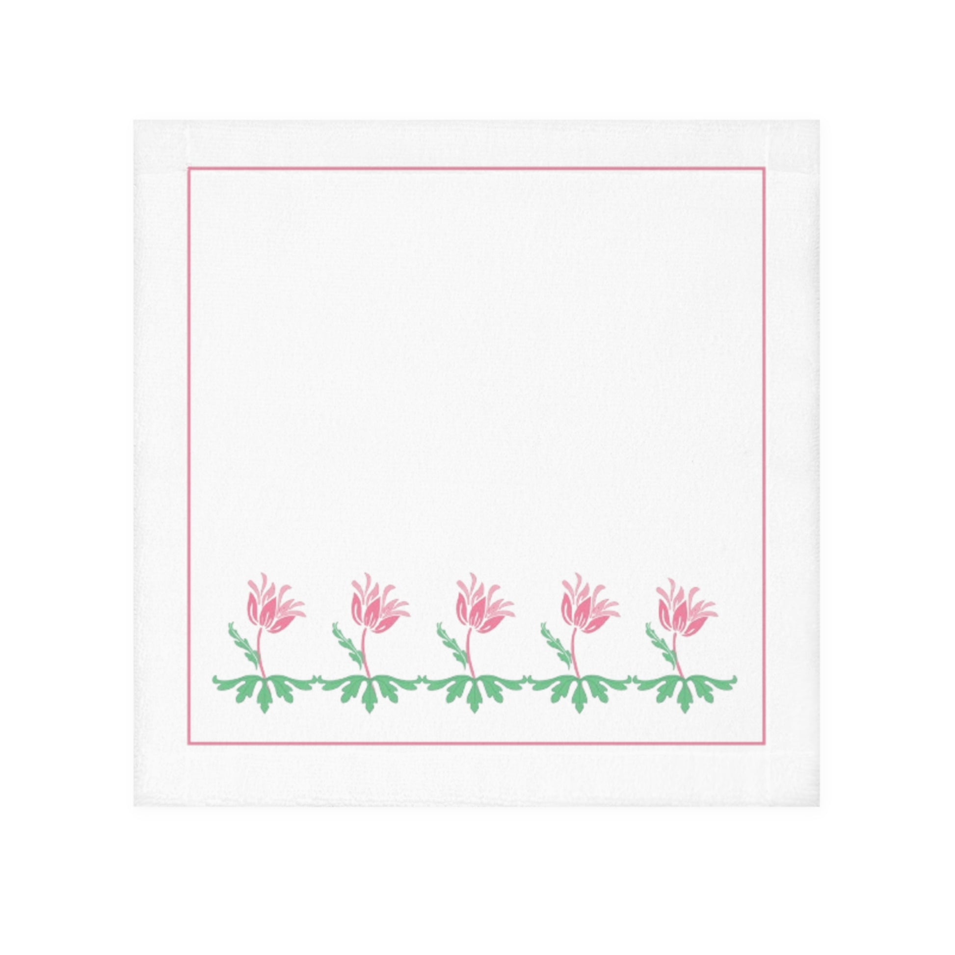 A white face towel with a printed floral design along the lower edge, in pink and green colors.