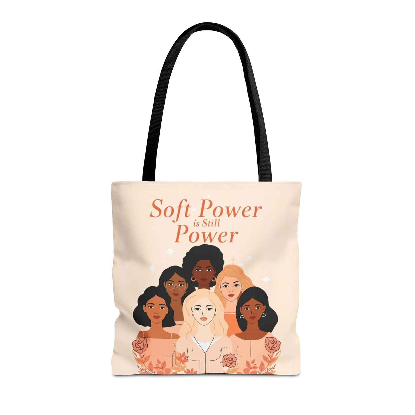 Tote bag with illustrations of diverse women and text 'Soft Power is Still Power' on a beige background