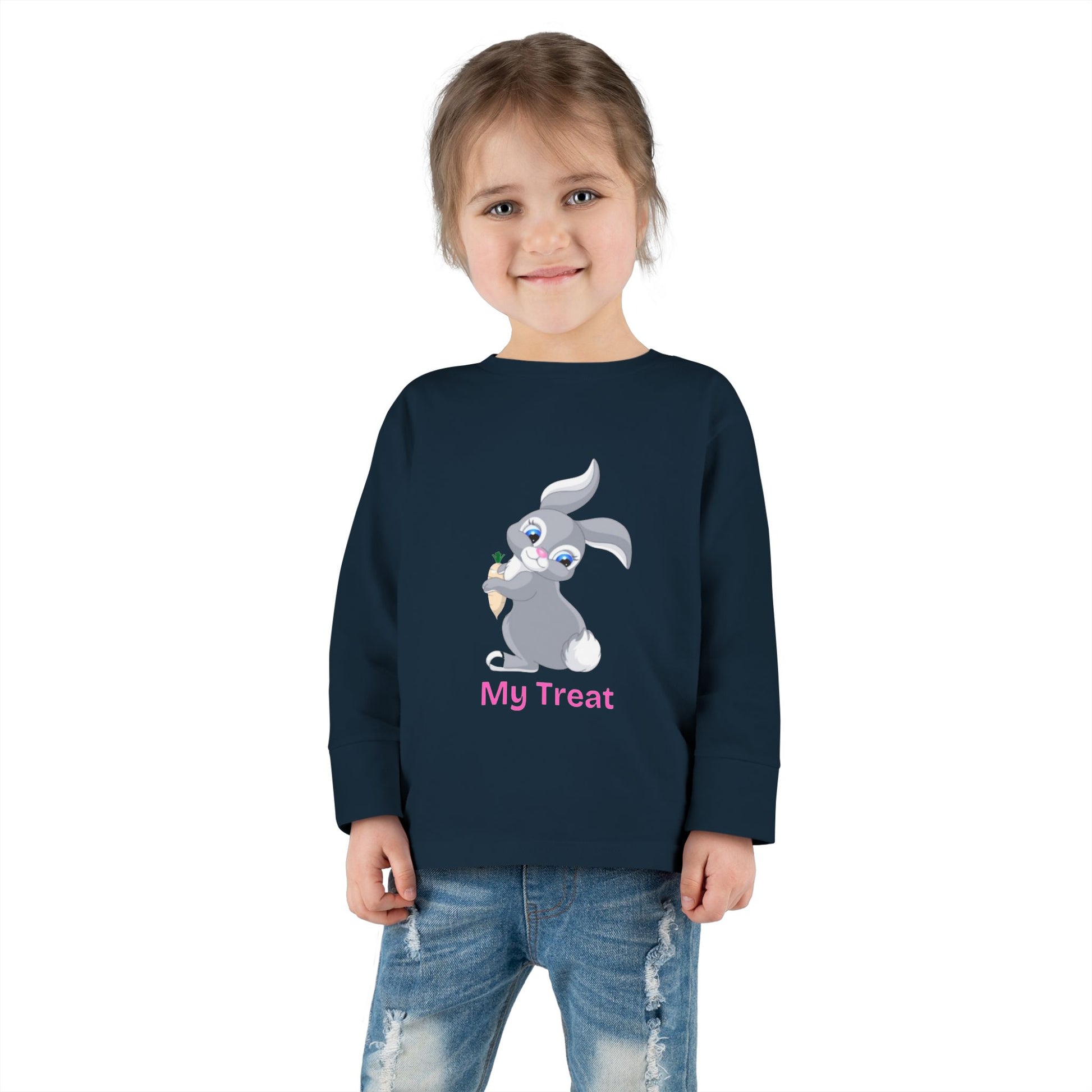 Child wearing a navy blue sweatshirt with a bunny graphic and 'My Treat' text on a white background
