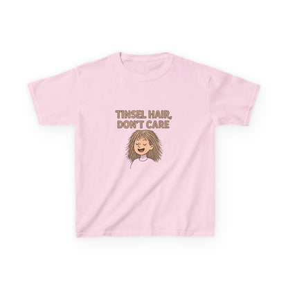 Pink t-shirt with 'Tinsel Hair, Don't Care' text and cartoon character on a white background
