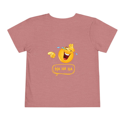 Pink t-shirt with a laughing emoji design on the back.