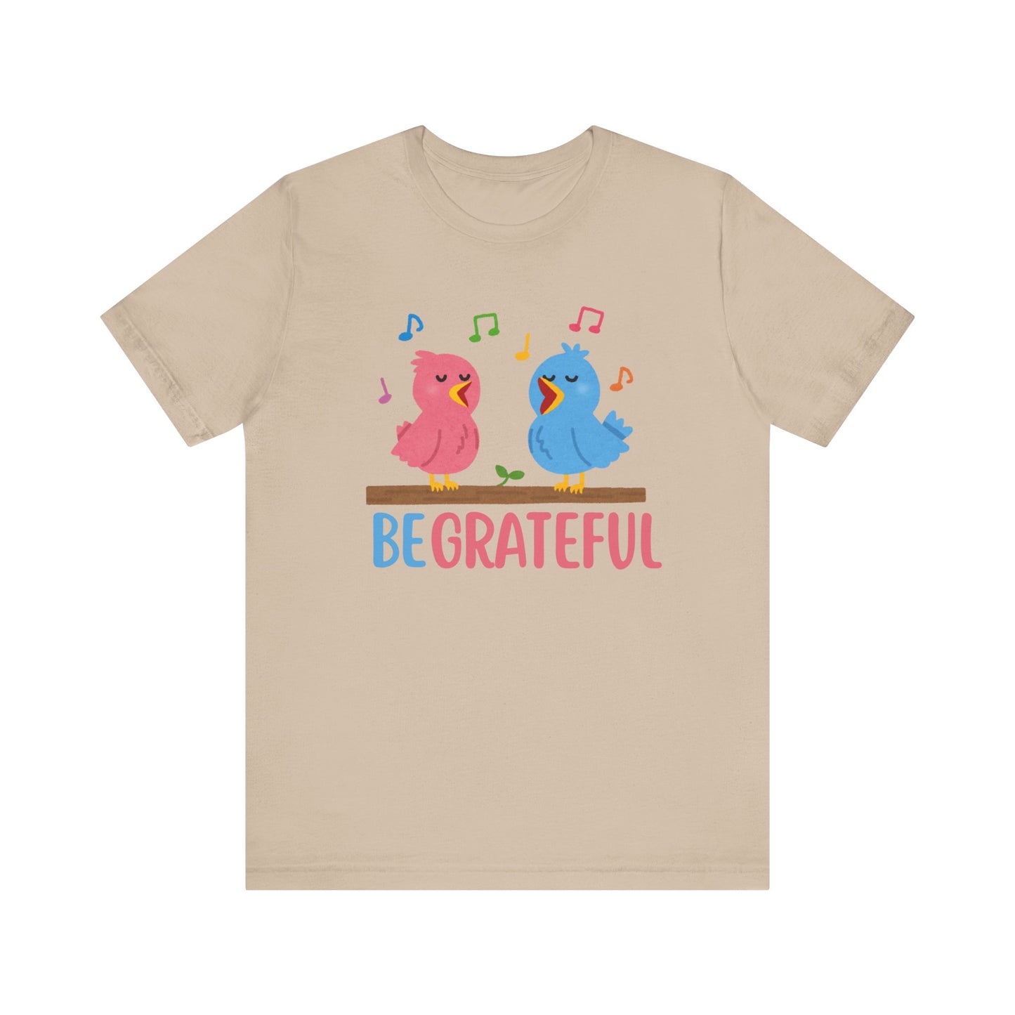 T-shirt with “Be Grateful” text and two bird illustrations – inspirational and nature-themed design for everyday wear.