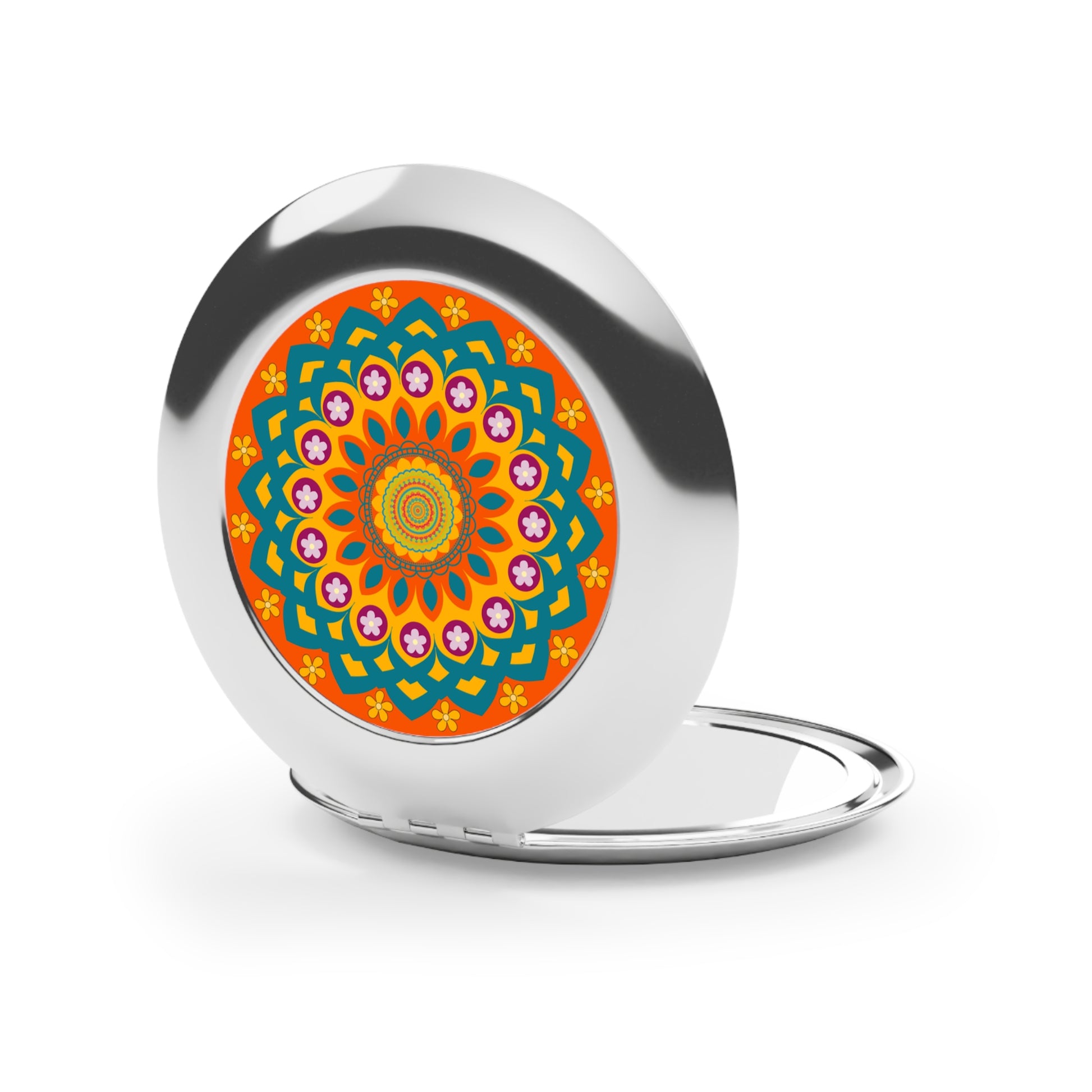 Compact travel mirror with a colorful mandala design on the cover, featuring floral pattern in vibrant colors.
