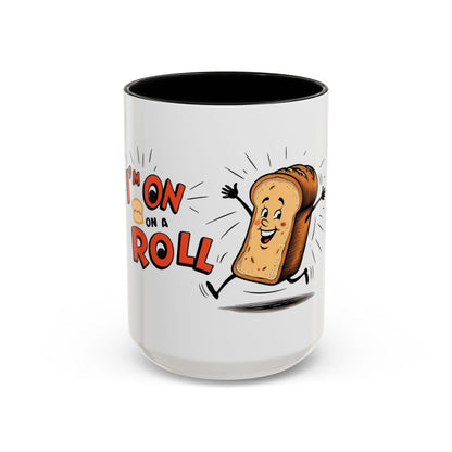 A white ceramic coffee mug with a black interior, featuring an illustration of a bread character with the words 'on a roll' and a smiling face.