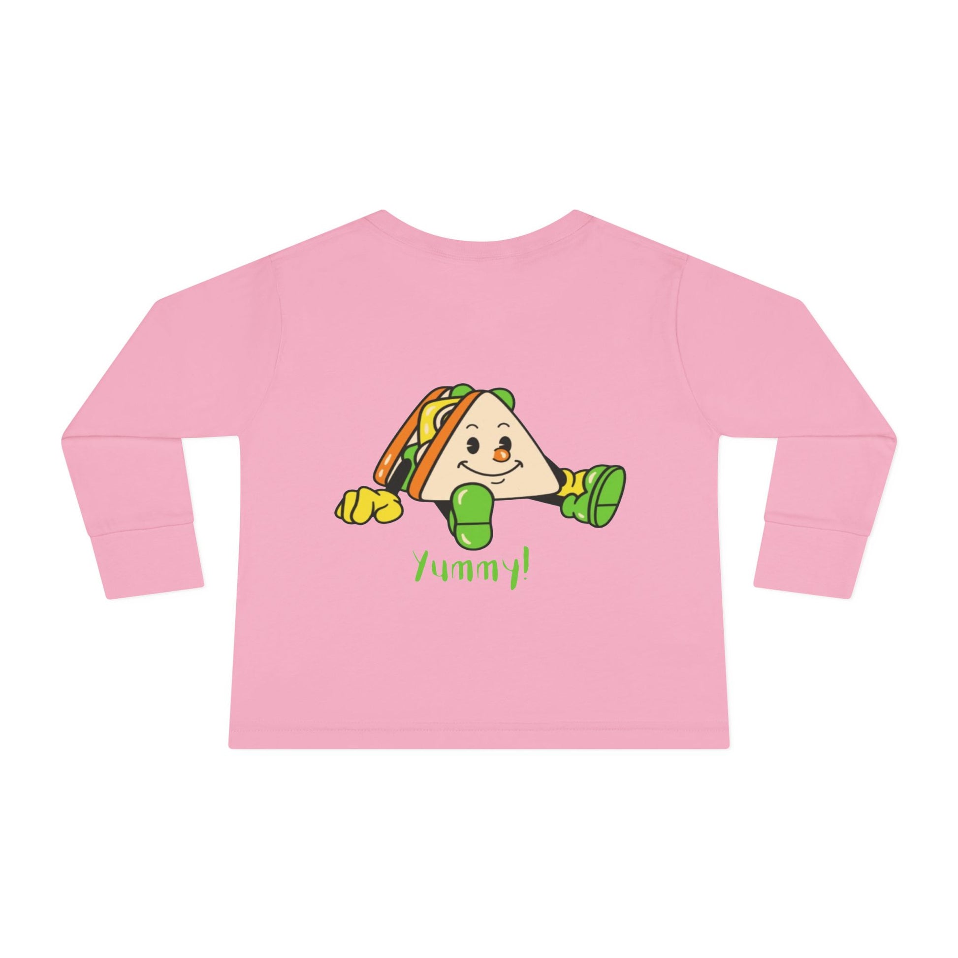 Pink long-sleeve shirt with a cartoon taco design and 'Yummy!' text on a white background