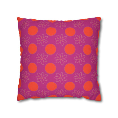 A square-shaped pillowcase with a pattern of orange circles and flowers on a purple background.