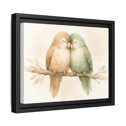 Framed artwork of two birds on a branch with a black frame.
