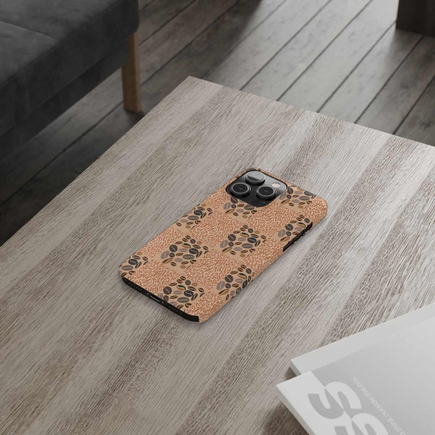 Phone case with floral pattern on wooden table