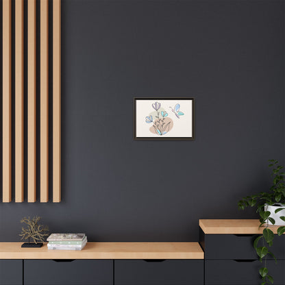 Framed artwork on a dark wall with wooden furniture and plants.