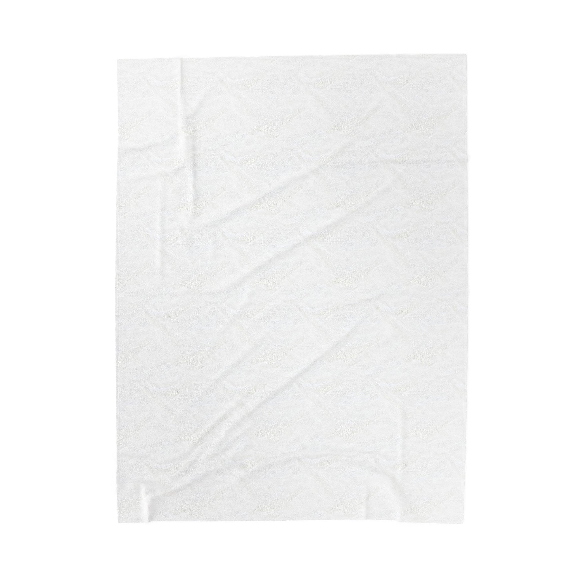 White quilt with geometric pattern on a white background
