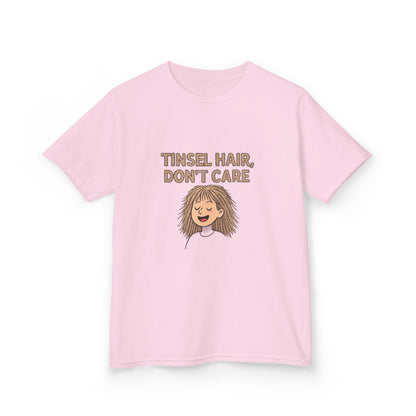 Pink t-shirt with 'Tinsel Hair, Don't Care' text and cartoon character on a white background