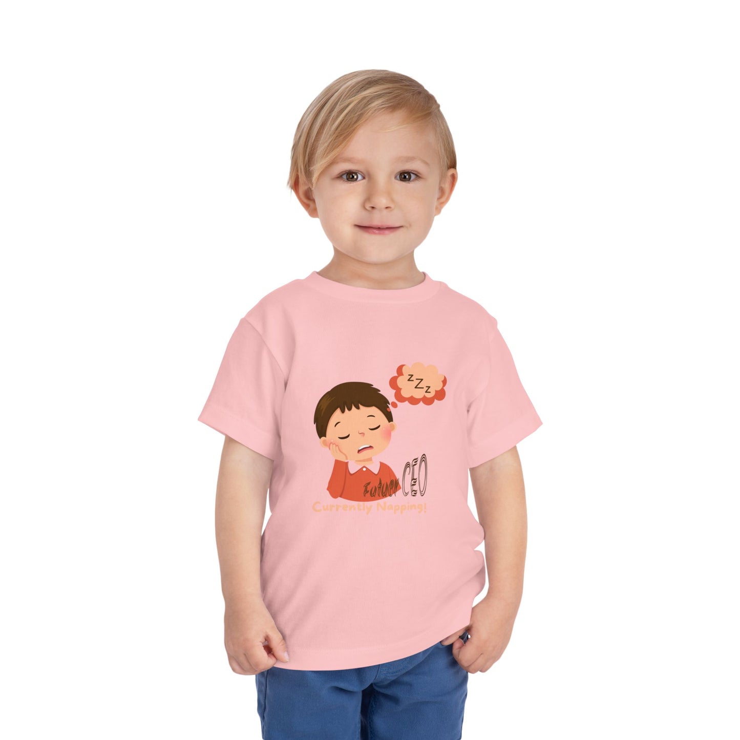 Child wearing a pink t-shirt with a cartoon design on a white background

