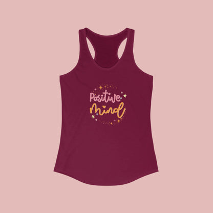 A  solid cardinal red women's racerback tank top with 'Positive Mind' text printed in the center in a cursive font, surrounded by small heart shapes.
