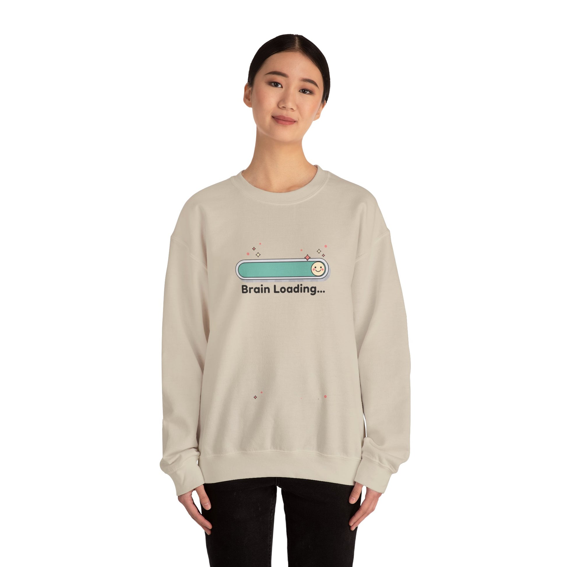 Person wearing a beige sweatshirt with 'Brain Loading...' graphic on a white background