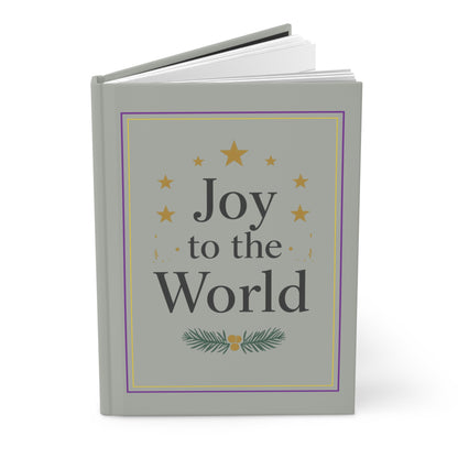 Book with 'Joy to the World' text on a gray cover with decorative elements