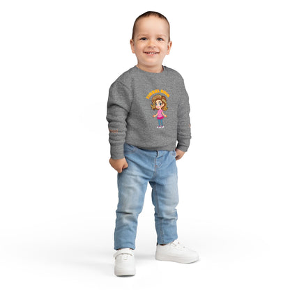 Child wearing a gray sweater with a cartoon character on a white background