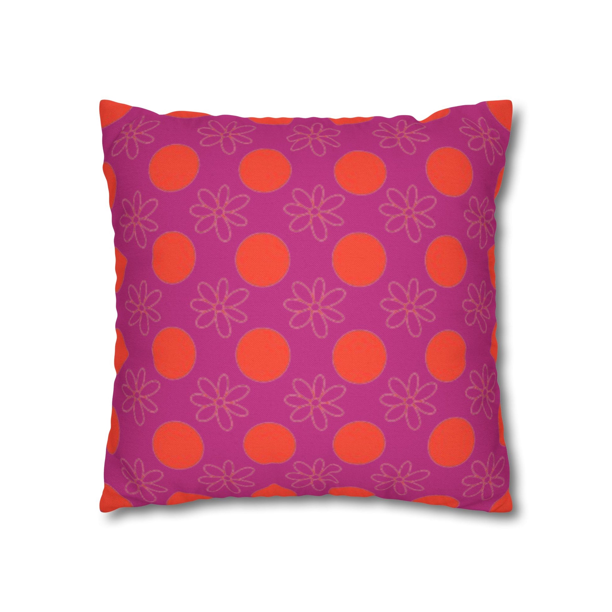 Decorative pillow with purple background and red circle and floral pattern.