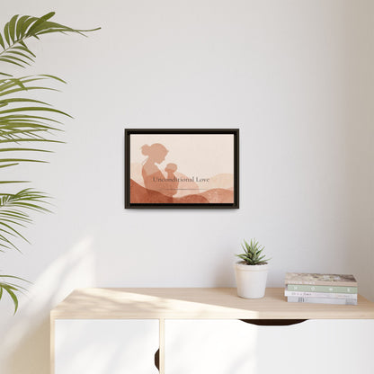 Framed artwork of a silhouette with text on a wall above a desk with a plant and books.