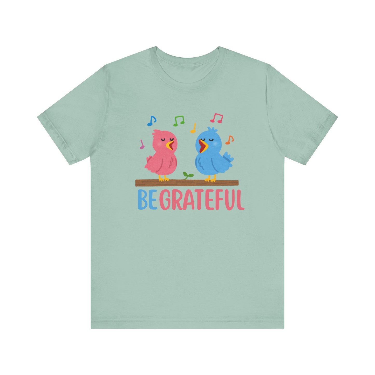 T-shirt with “Be Grateful” text and two bird illustrations – inspirational and nature-themed design for everyday wear.