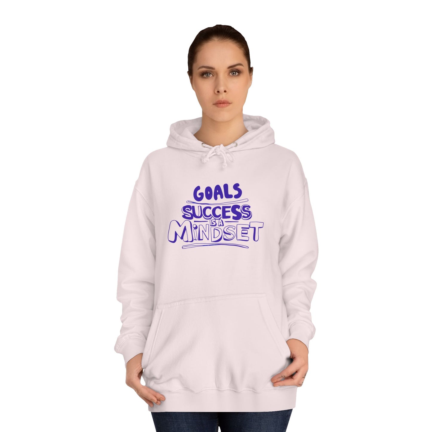 Person wearing a light pink hoodie with a motivational quote on a white background