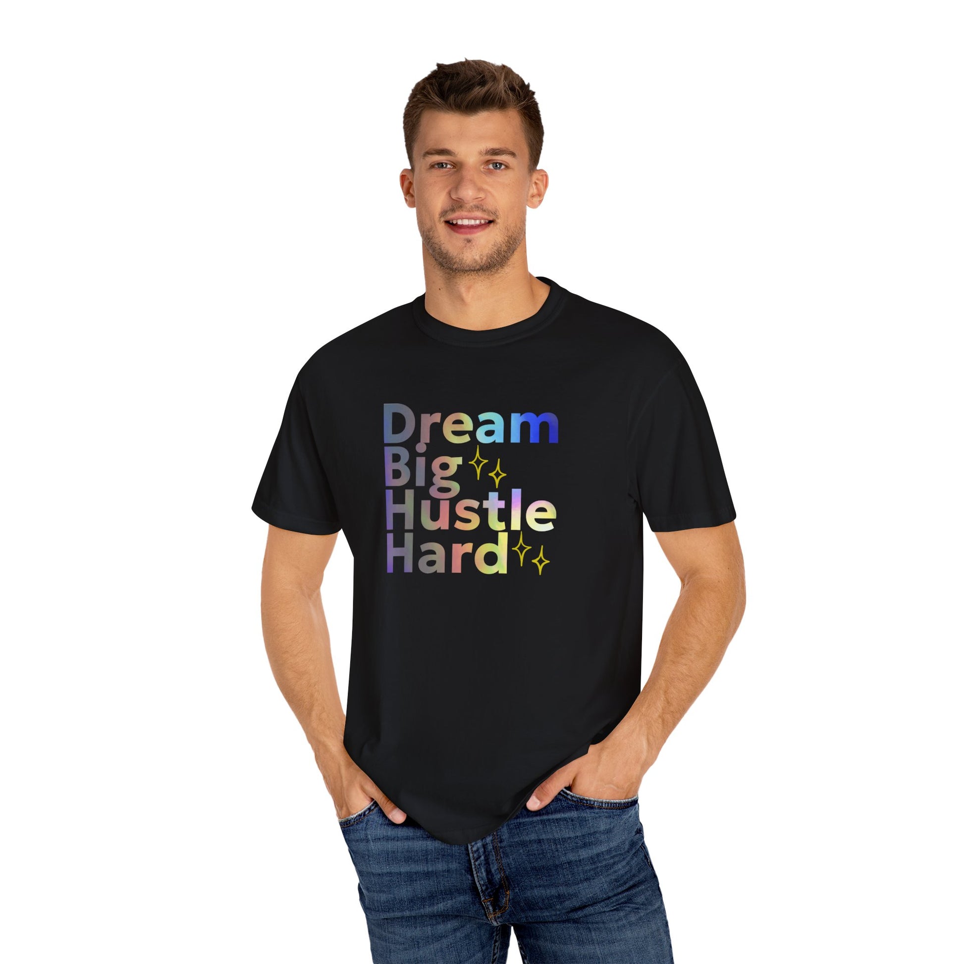 Man wearing a black t-shirt with colorful text 'Dream Big Hustle Hard' on a white background