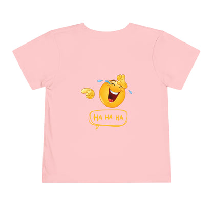 Pink t-shirt with a laughing emoji design on a white background