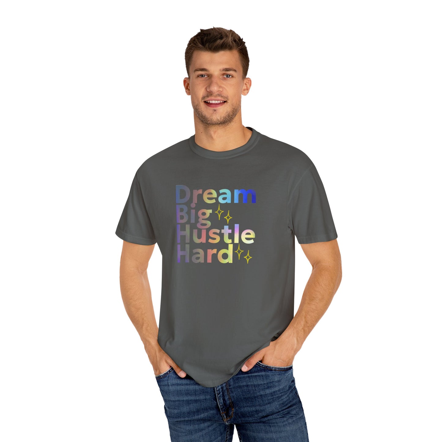 Man wearing a gray t-shirt with colorful text 'Dream Big Hustle Hard' on a white background