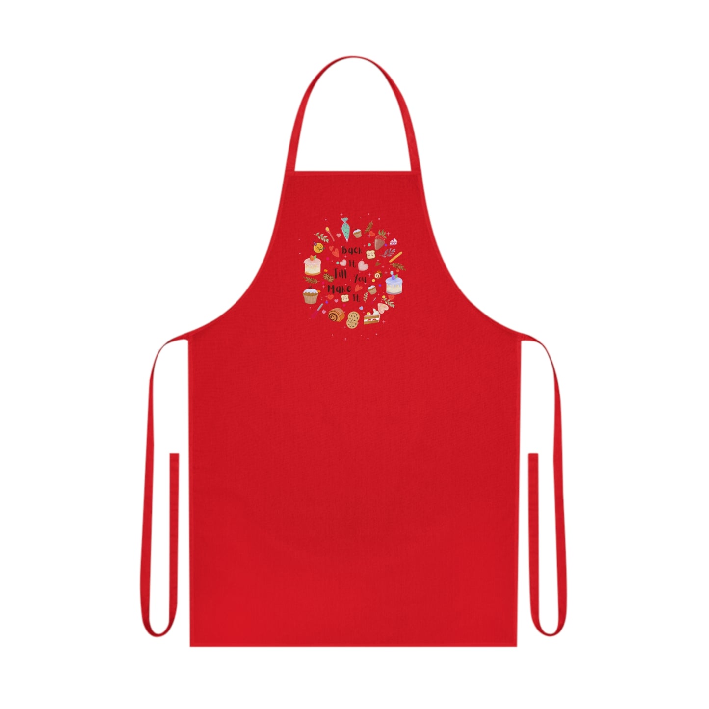 Cotton kitchen apron with "Bake it till you make it" text and circular illustrations of cake, biscuit, cone, and baking utensils.

