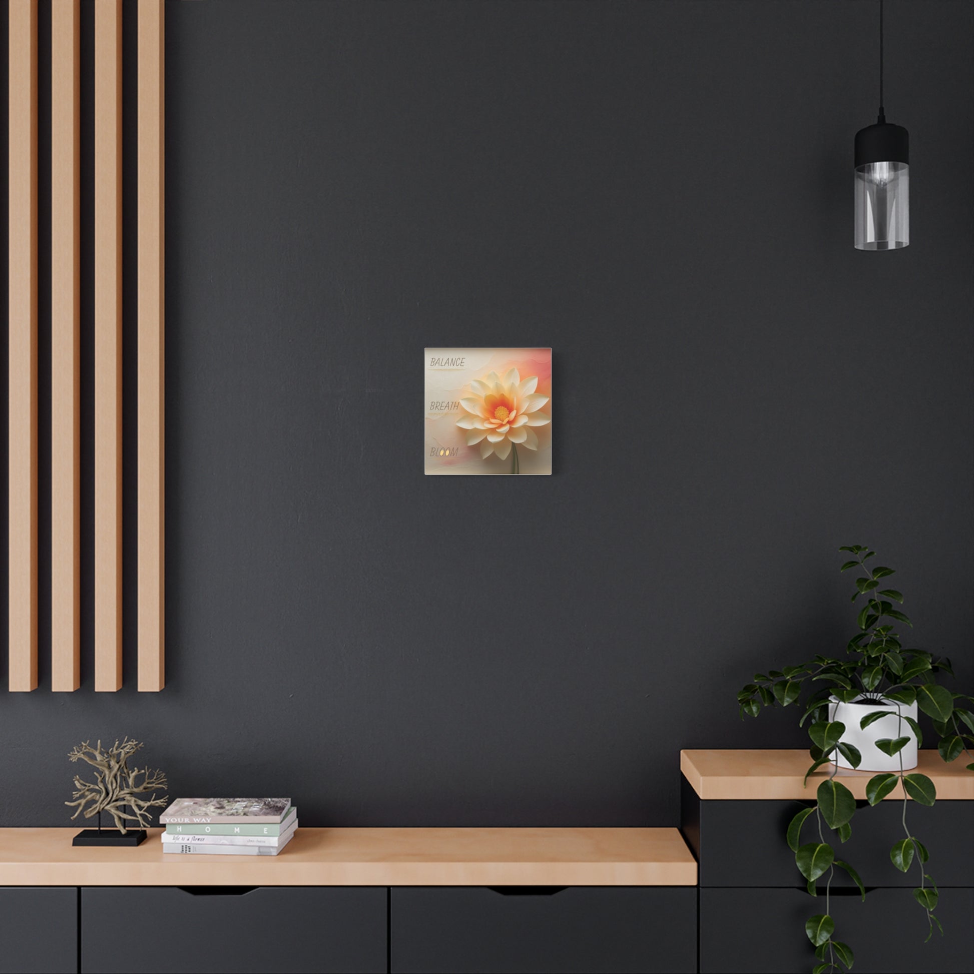 Modern interior with a wall art piece of a flower on a dark wall.