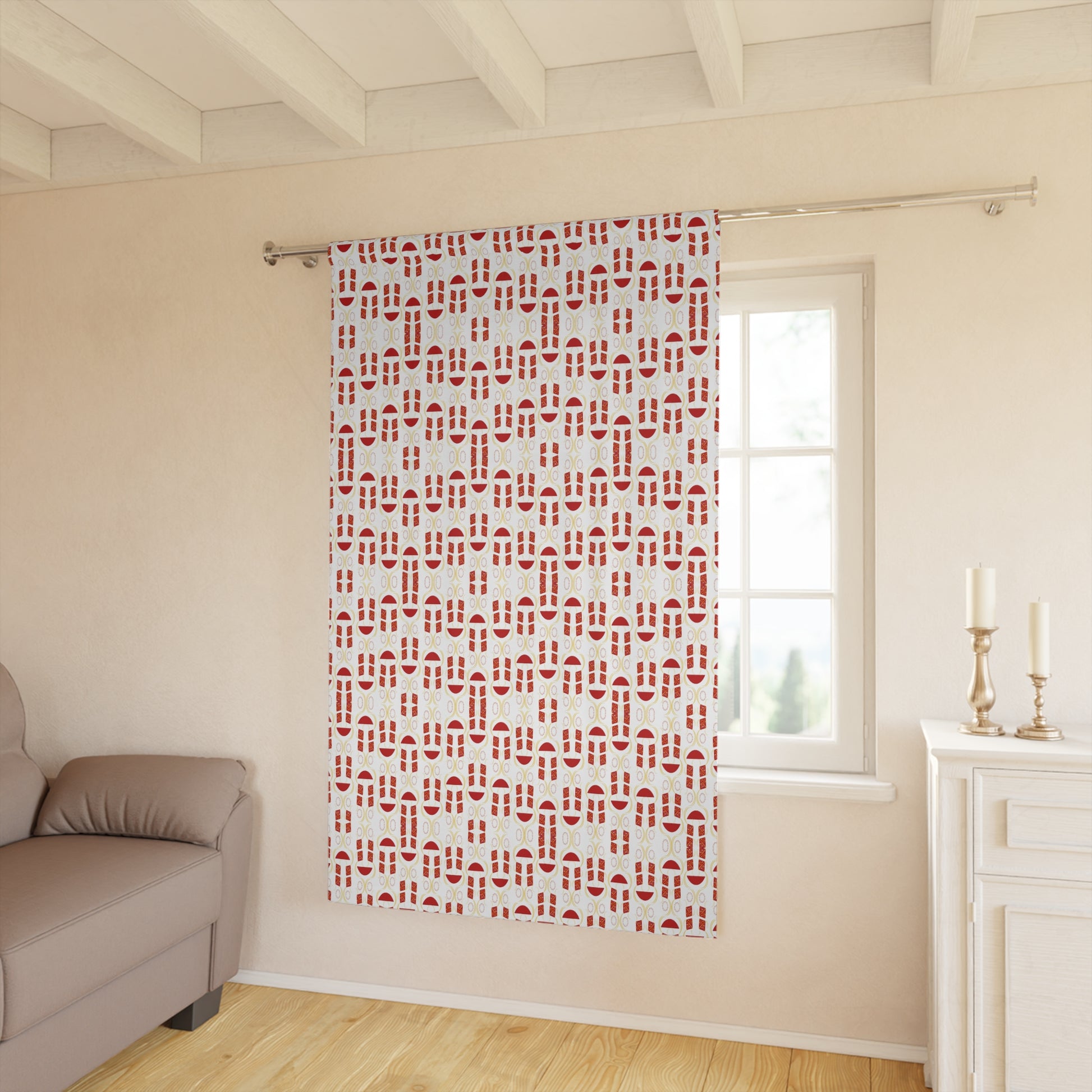 Red and white geometric pattern curtain hanging on window in a modern room

