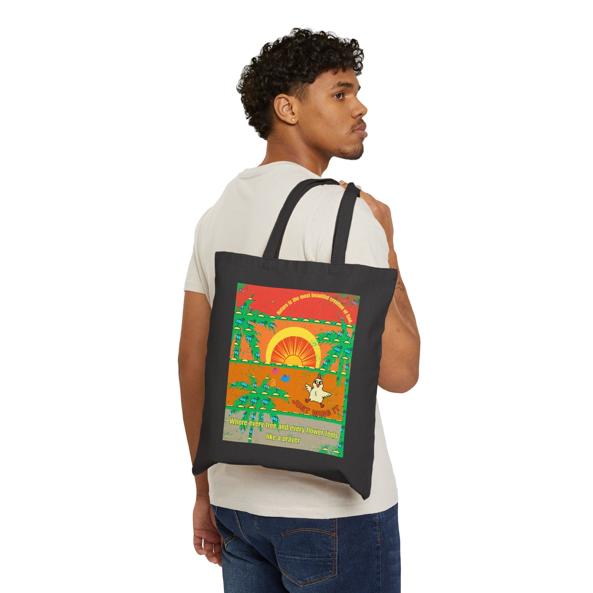 Person carrying a tote bag with a colorful design