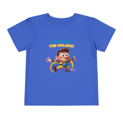 Cartoon boy jumping with rainbow trail and "Spread the Colors!" text on true royal T-shirt.

