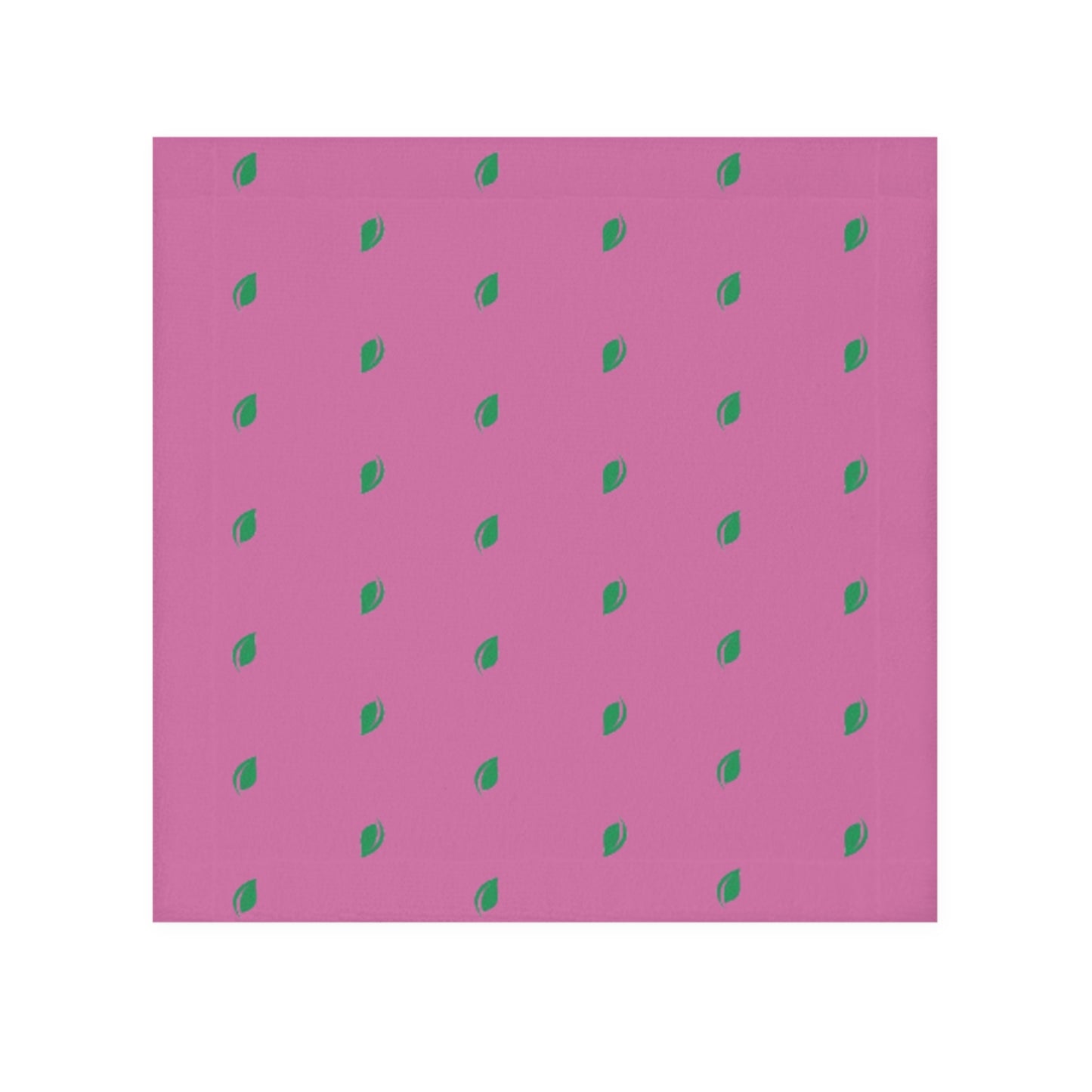A pink face towel with a pattern of small, green leaf-like shapes distributed evenly over the surface.

