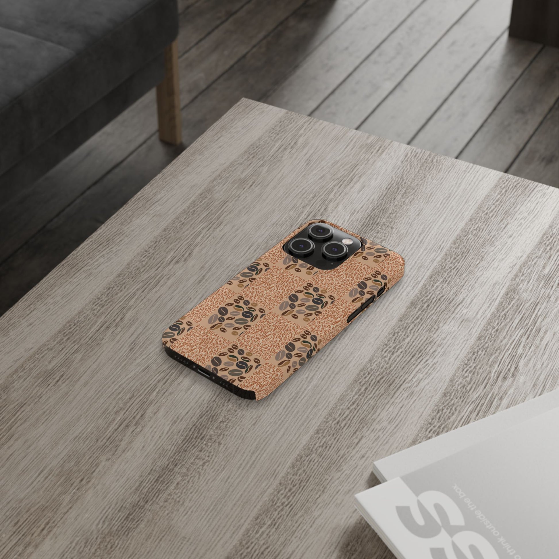 Phone case with paw print design on a wooden table
