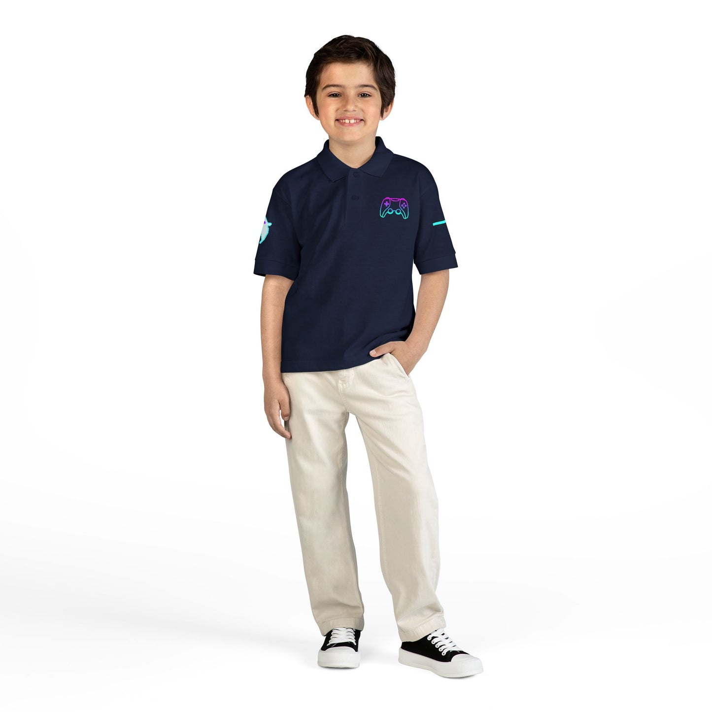 Child wearing a black polo shirt with a logo and white pants on a white background