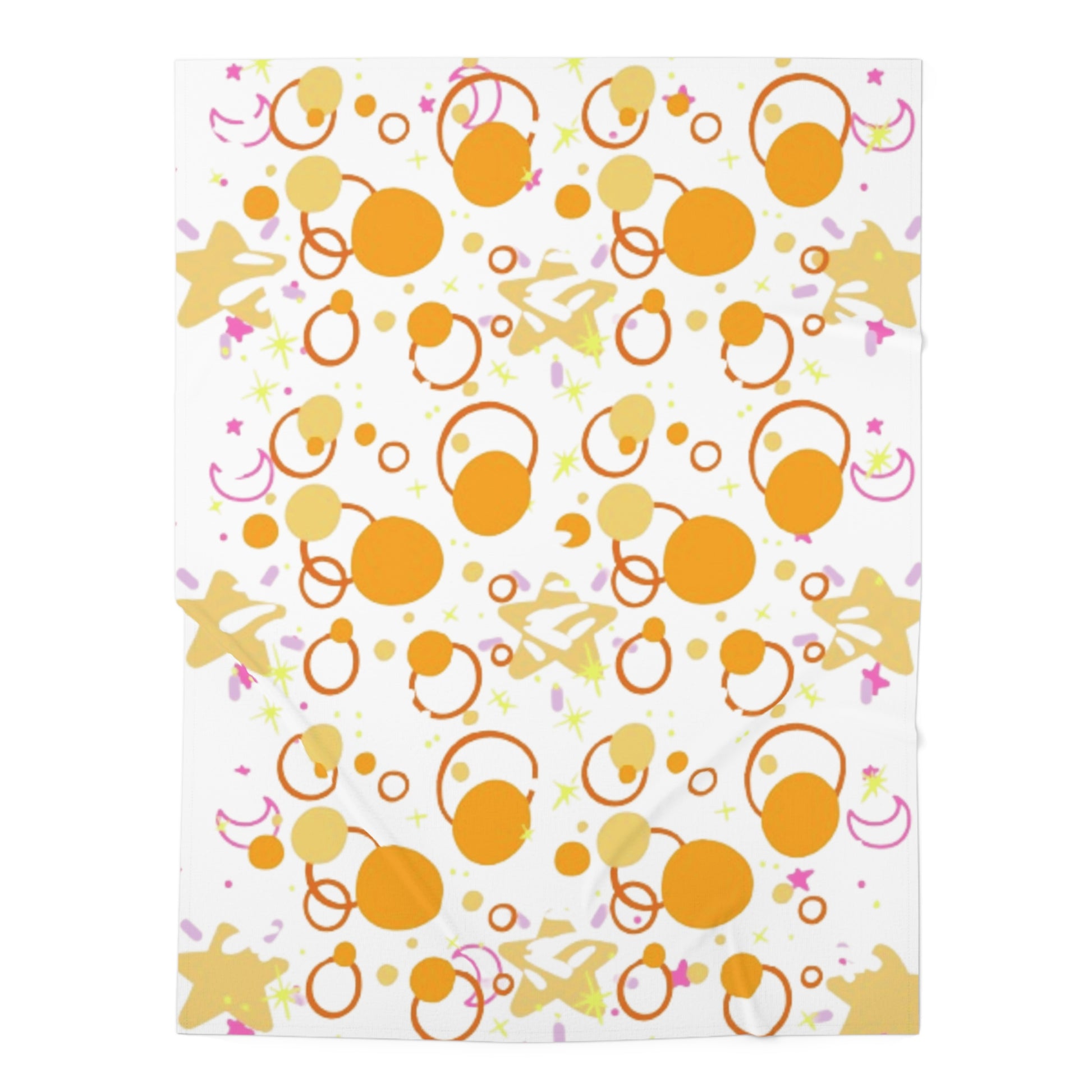A baby swaddle blanket with an orange and white pattern, possibly with stars and other geometric shapes.