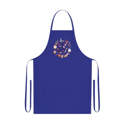 Cotton kitchen apron with "Bake it till you make it" text and circular illustrations of cake, biscuit, cone, and baking utensils.

