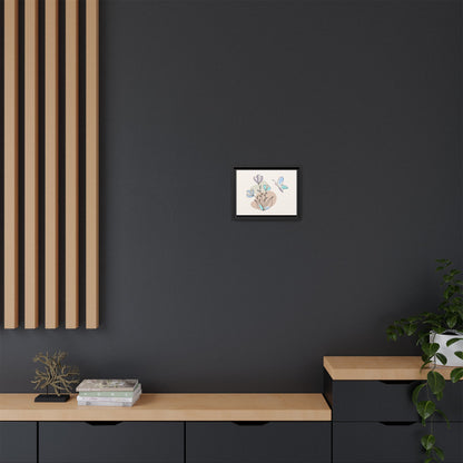 Framed artwork on a dark wall with wooden shelves and decor items.