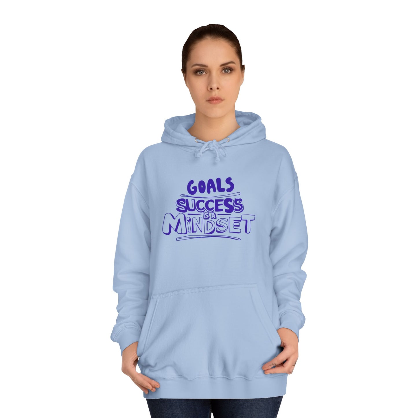 Person wearing a light blue hoodie with a motivational quote.