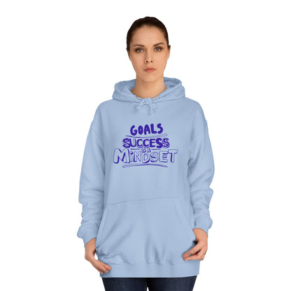 Person wearing a light blue hoodie with a motivational quote.