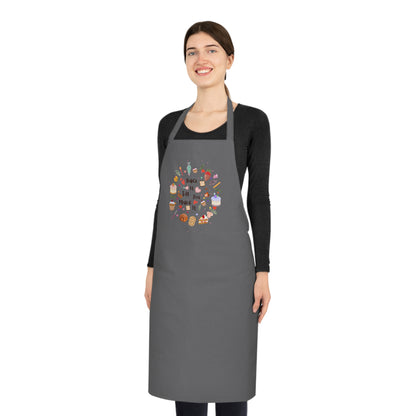 Woman wearing a gray apron with a colorful design on a white background