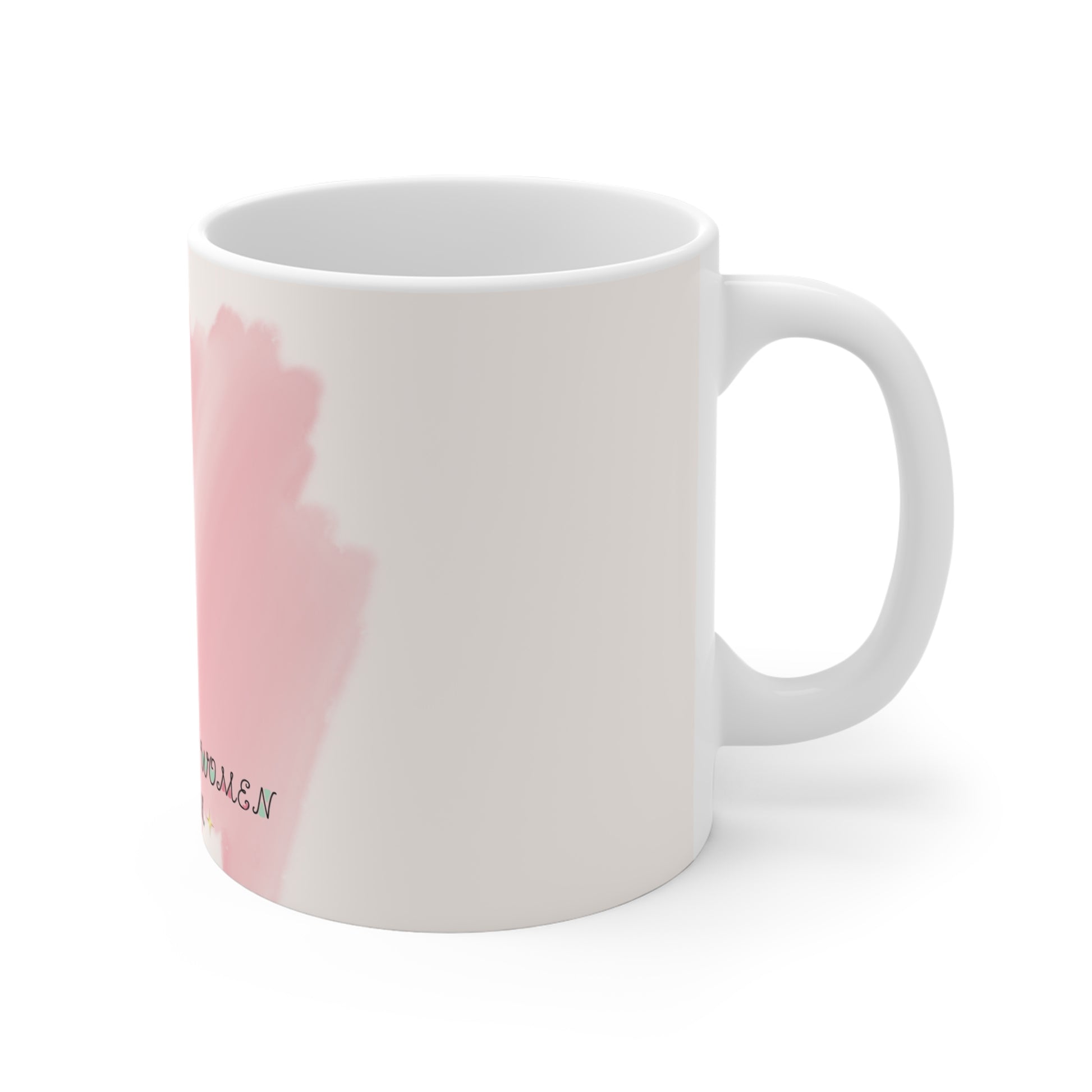 White mug with pink floral design on a white background