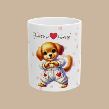 A white ceramic mug with a cartoon dog character holding a heart, and the phrase 'You Me Forever' printed on it, surrounded by a pattern of pink hearts.


