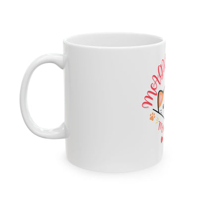 White mug with a cat design and text on a white background