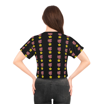 A black crop top with a colorful all-over floral print