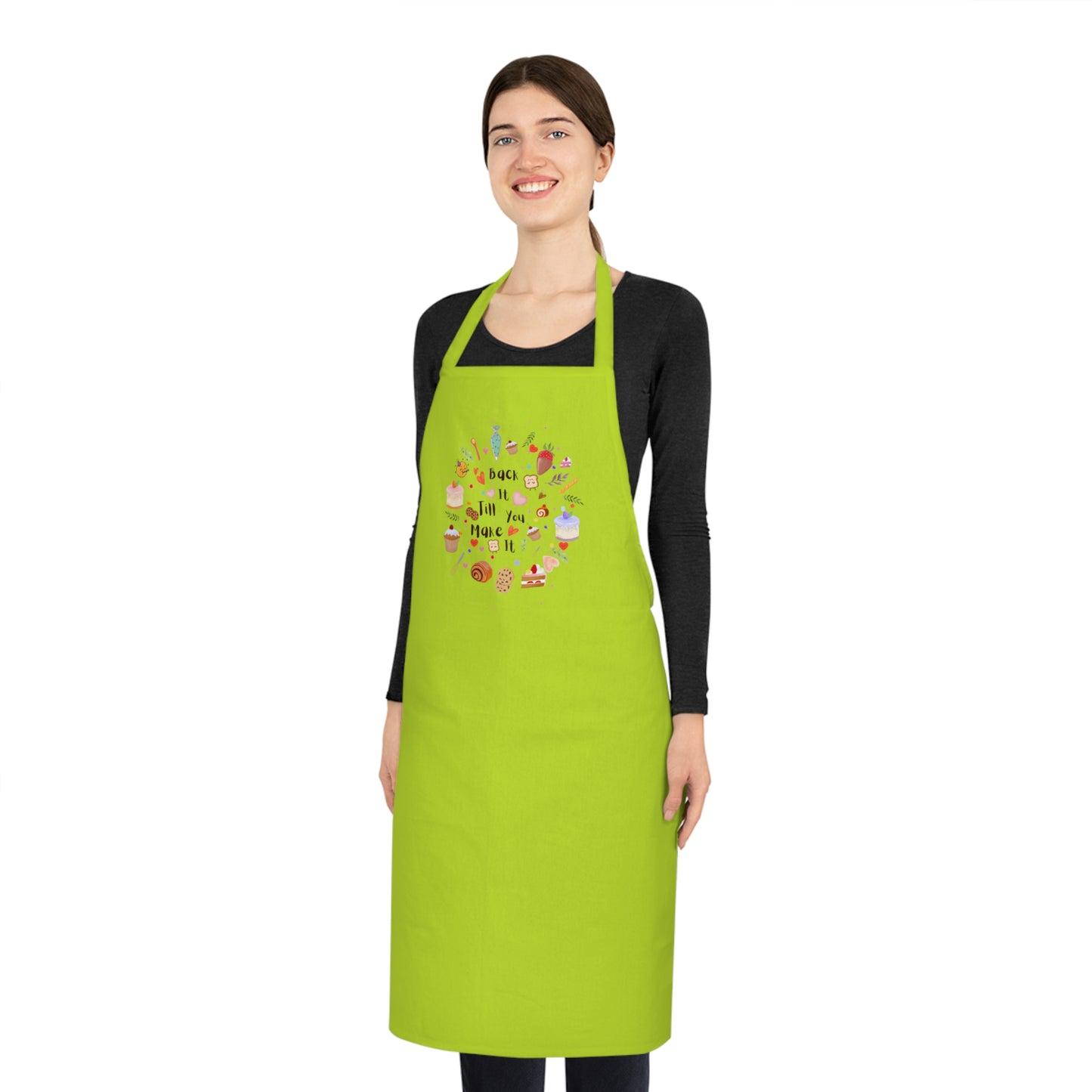Woman wearing a green apron with a colorful design on a white background