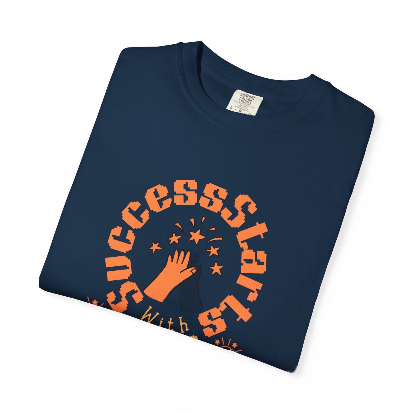 Folded navy blue t-shirt with orange text and graphics on a white background